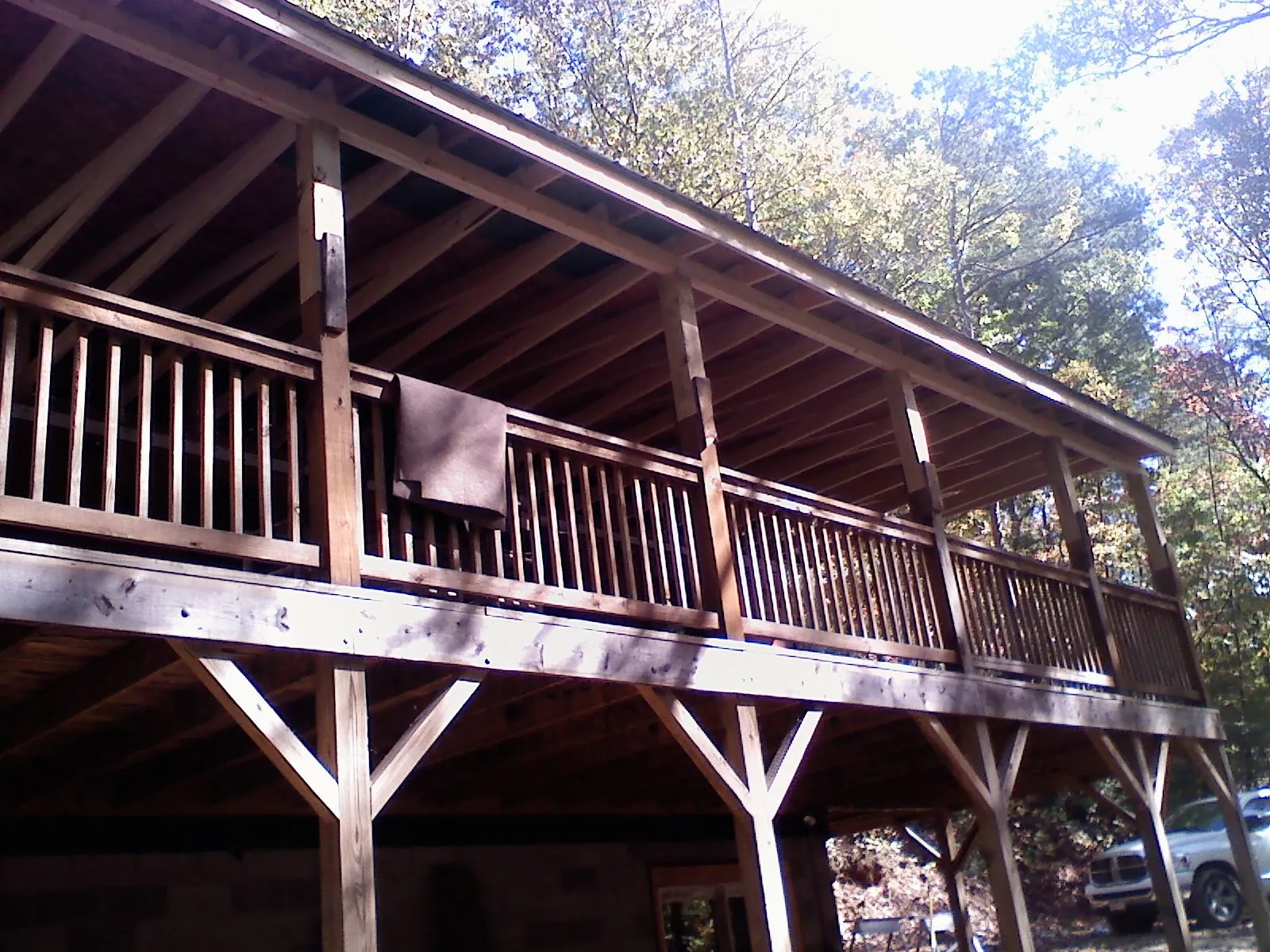 Timber framing under a new elevated porch and deck — Roof Leak Repair in Center Moriches by Roofing Brothers